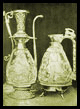 flagon, used to hold wine during Mass, from which one would fill two or more chalices for Communion