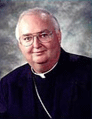 Bishop Patrick McGrath; he earned a doctorate in canon law in Rome