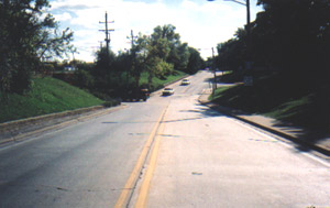 Turn left under the viaduct.