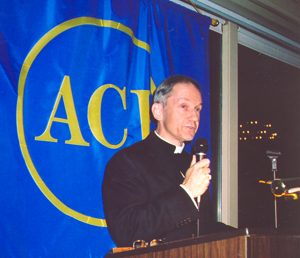 Bishop Thomas Paprocki of the Archdiocese of Chicago, saying grace before meals