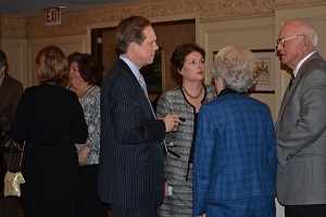 Jerry and Chris Bern (left), greeting Bobbie and Joe Noonan (right)