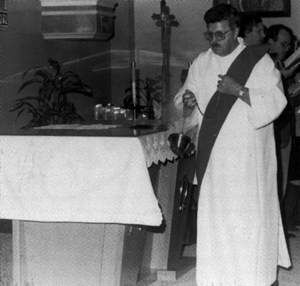Deacon incensing the altar