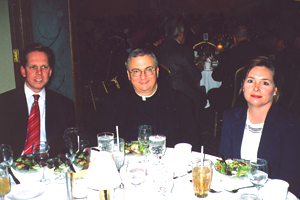 Jerry and Chris Bern, with Father Pat Lagges