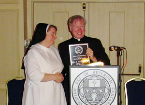 Sister Mary Paul here receives the Gratiam Dei Award.