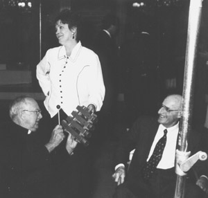 Father Charles Kouba, Evie Hanson, Frank Termini