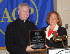 Coleen Mast (right) is presented with the ACP Henry Hyde Award for 2010, for her writing and broadcasting on a pro-life theme.