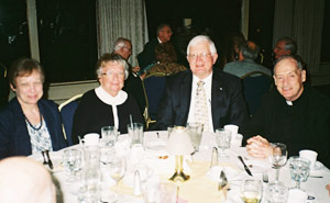 Darlene Ruhl, Beth Ehlman, Pete Ruhl, and Father Jim Flynn